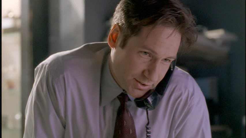 x files mulder on phone Blank Meme Template