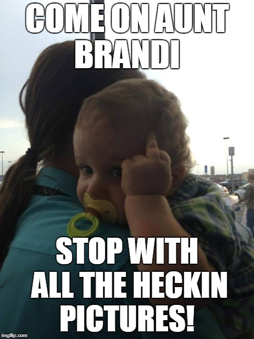 Annoyed nephew  | COME ON AUNT BRANDI; STOP WITH ALL THE HECKIN PICTURES! | image tagged in annoyed,baby,middle finger,pictures,memes | made w/ Imgflip meme maker