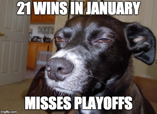 Suspicious dog | 21 WINS IN JANUARY; MISSES PLAYOFFS | image tagged in suspicious dog | made w/ Imgflip meme maker