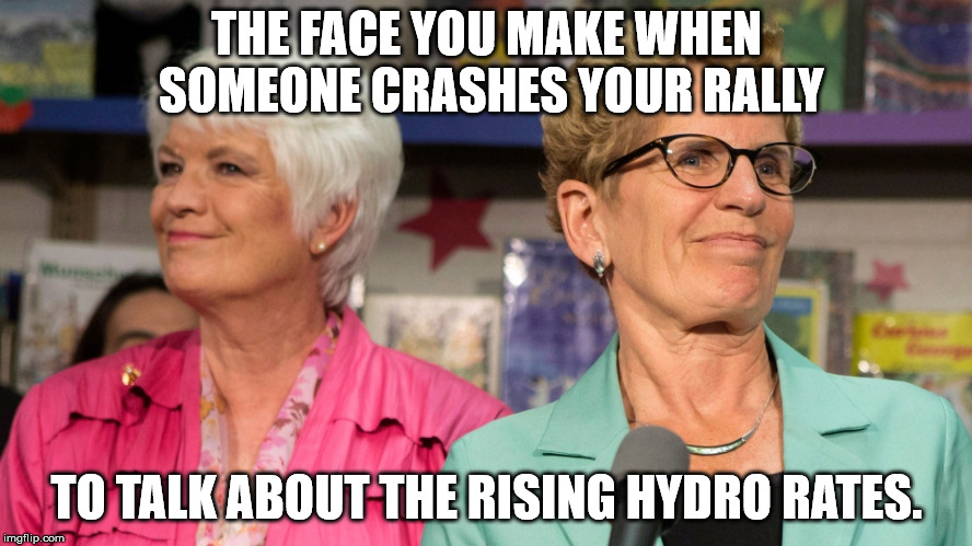 Liz Sandals and Kathleen Wynne | THE FACE YOU MAKE WHEN SOMEONE CRASHES YOUR RALLY; TO TALK ABOUT THE RISING HYDRO RATES. | image tagged in liz sandals and kathleen wynne | made w/ Imgflip meme maker
