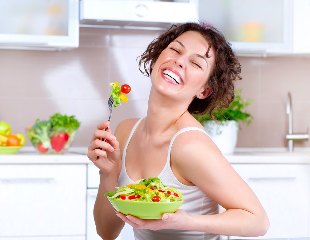 Woman laughing eating a salad Blank Meme Template