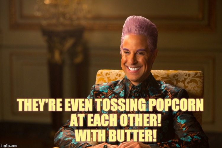 Hunger Games/Caesar Flickerman (Stanley Tucci) "heh heh heh" | THEY'RE EVEN TOSSING POPCORN    AT EACH OTHER!           WITH BUTTER! | image tagged in hunger games/caesar flickerman stanley tucci heh heh heh | made w/ Imgflip meme maker