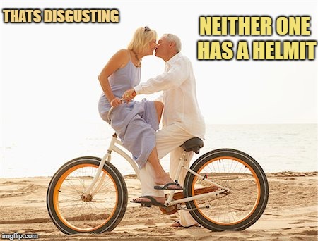 no regard for safety  | NEITHER ONE HAS A HELMIT; THATS DISGUSTING | image tagged in bikers,lovers,beach,kissing,funny,meme | made w/ Imgflip meme maker