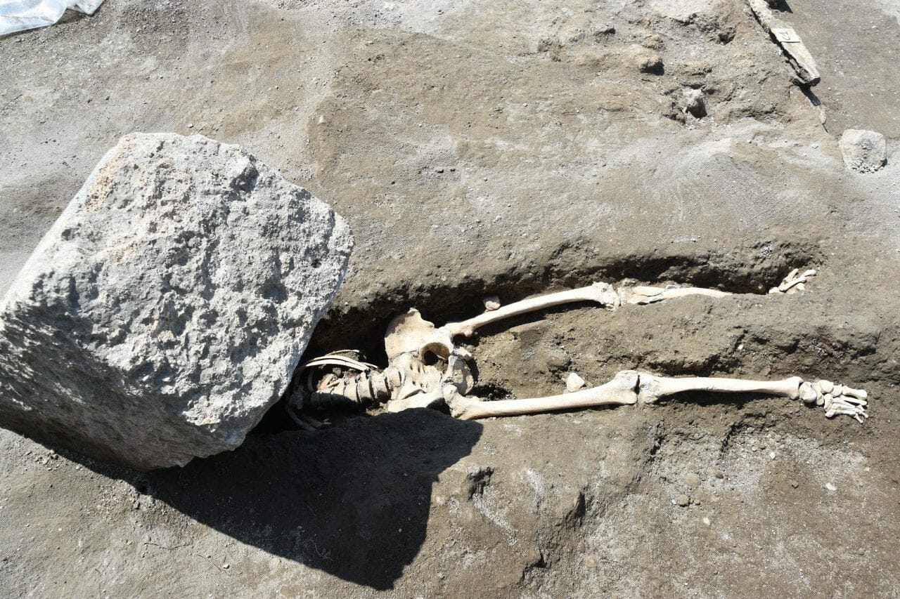 High Quality Skeleton crushed by volcanic rock from pompeii Blank Meme Template