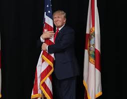 High Quality Trump grouping the flag. Blank Meme Template
