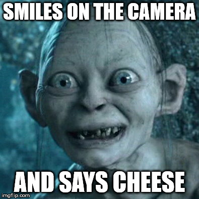 Gollum | SMILES ON THE CAMERA; AND SAYS CHEESE | image tagged in memes,gollum | made w/ Imgflip meme maker