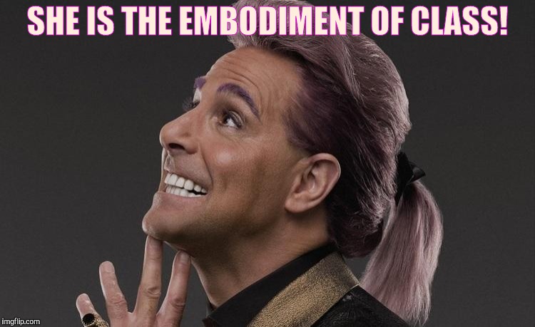Hunger Games - Caesar Flickerman (Stanley Tucci) "Here it comes! | SHE IS THE EMBODIMENT OF CLASS! | image tagged in hunger games - caesar flickerman stanley tucci here it comes | made w/ Imgflip meme maker