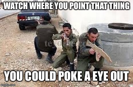 The cardboard shootout | WATCH WHERE YOU POINT THAT THING; YOU COULD POKE A EYE OUT | image tagged in guns | made w/ Imgflip meme maker