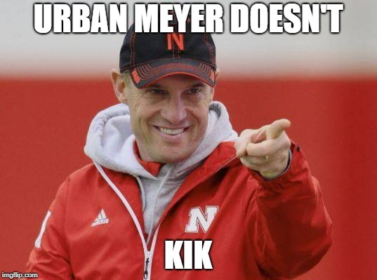 Happy Mike Riley | URBAN MEYER DOESN'T; KIK | image tagged in happy mike riley | made w/ Imgflip meme maker