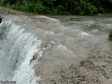 dropping rock into water splash gif