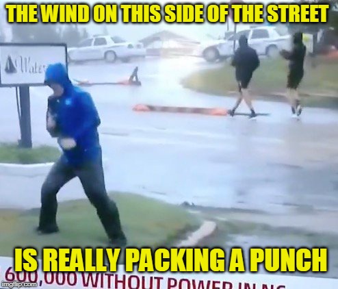 Blown Away | THE WIND ON THIS SIDE OF THE STREET; IS REALLY PACKING A PUNCH | image tagged in hurricane florence,fake news | made w/ Imgflip meme maker
