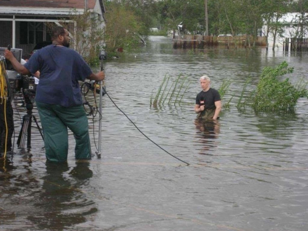 High Quality CNN's Anderson Cooper on knees in water Blank Meme Template