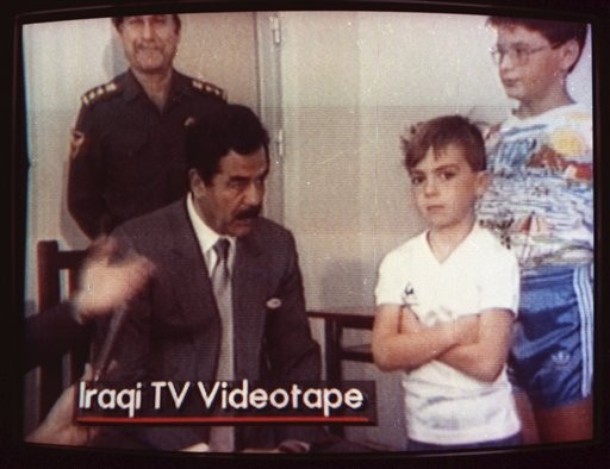 Saddam and boy on TV Blank Meme Template