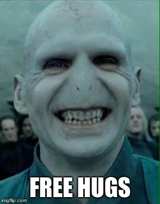 THEY R FREE | FREE HUGS | image tagged in voldemort grin | made w/ Imgflip meme maker