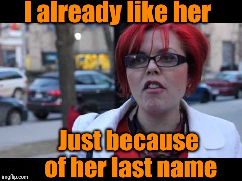 I already like her Just because of her last name | image tagged in smiling feminist | made w/ Imgflip meme maker