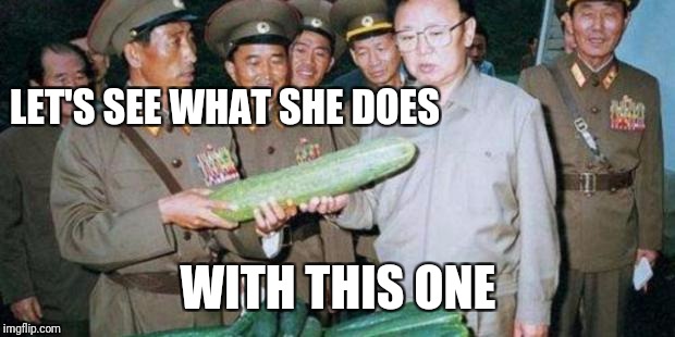 Kim Jong Ill Cucumber | LET'S SEE WHAT SHE DOES WITH THIS ONE | image tagged in kim jong ill cucumber | made w/ Imgflip meme maker