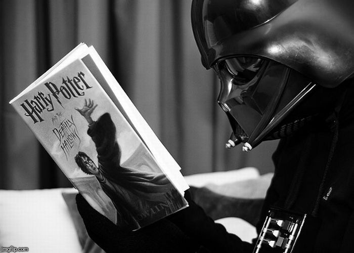 Darth Vader reading Harry Potter | image tagged in darth vader reading harry potter | made w/ Imgflip meme maker