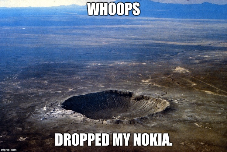 WHOOPS; DROPPED MY NOKIA. | image tagged in technology | made w/ Imgflip meme maker