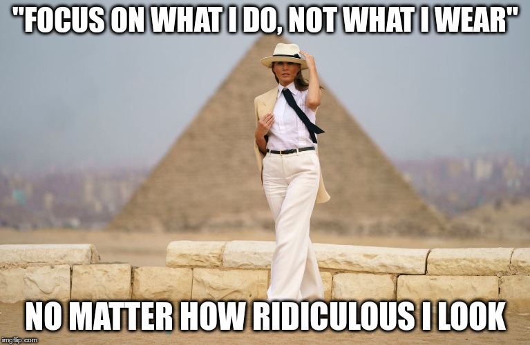 Who told her it was a good idea to look like a 19th Century Colonist? | "FOCUS ON WHAT I DO, NOT WHAT I WEAR"; NO MATTER HOW RIDICULOUS I LOOK | image tagged in melania trump,humor,africa,pith helmet,racism | made w/ Imgflip meme maker