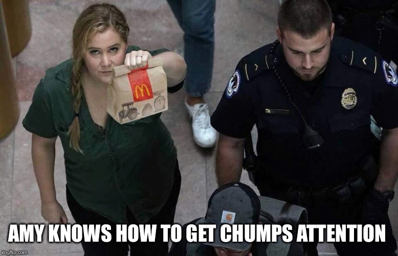 AMY KNOWS HOW TO GET CHUMPS ATTENTION | image tagged in trumps lover of the week | made w/ Imgflip meme maker
