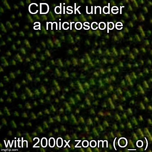 CD under microscope | image tagged in cd,disk,microscope,zoom | made w/ Imgflip meme maker