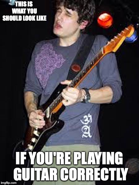 Playing Guitar | THIS IS WHAT YOU SHOULD LOOK LIKE; IF YOU'RE PLAYING GUITAR CORRECTLY | image tagged in guitar,memes | made w/ Imgflip meme maker