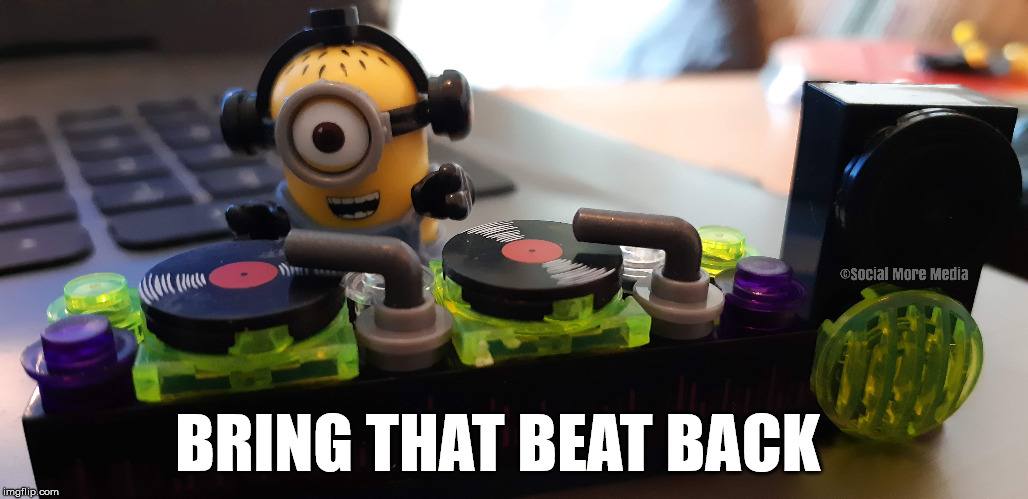 A Minion on the Wheels of Steel  | BRING THAT BEAT BACK | image tagged in wheels of steel,dj,playing vinyl records,minions,records | made w/ Imgflip meme maker