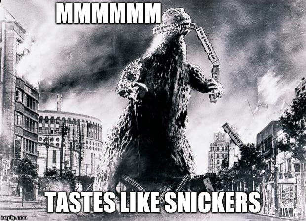 Godzilla tasting Snickers train | MMMMMM; TASTES LIKE SNICKERS | image tagged in godzilla | made w/ Imgflip meme maker