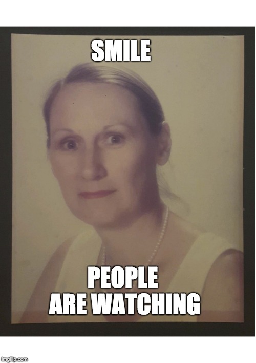 Angry MILF | SMILE; PEOPLE ARE WATCHING | image tagged in angry milf | made w/ Imgflip meme maker