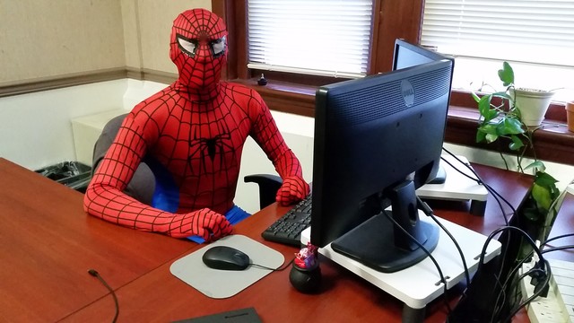 Friendly neigborhood spiderman at desk Blank Meme Template