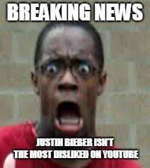 Thanks Youtube Rewind 2018 for that. *facepalm | BREAKING NEWS; JUSTIN BIEBER ISN'T THE MOST DISLIKED ON YOUTUBE | image tagged in scared black guy | made w/ Imgflip meme maker