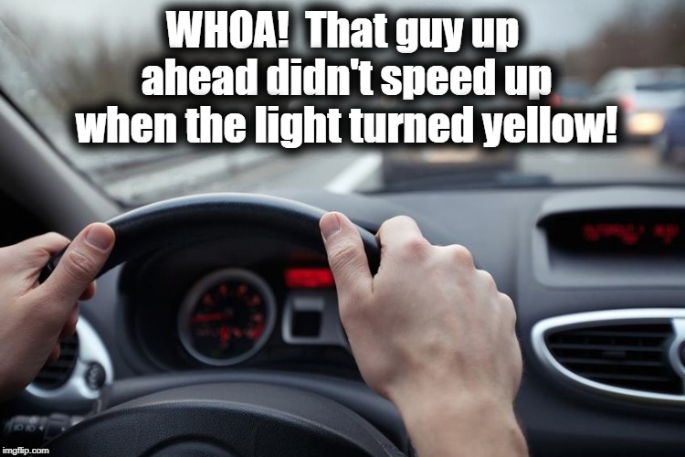 WHOA!  That guy up ahead didn't speed up when the light turned yellow! | made w/ Imgflip meme maker