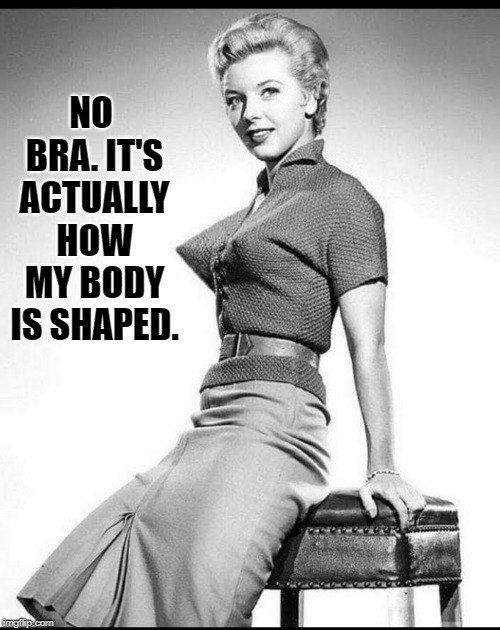 What "Alluring" Meant in the 50s | NO BRA. IT'S ACTUALLY HOW MY BODY IS SHAPED. | image tagged in vince vance,pointy tits,1950s,fashion in the 50s,pointy bra,black and white vintage model | made w/ Imgflip meme maker