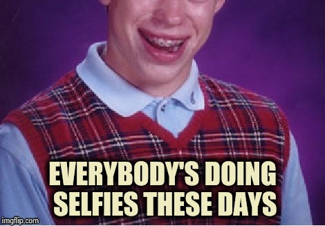 "Oh boy , it's got a camera !" | EVERYBODY'S DOING SELFIES THESE DAYS | image tagged in brian selfie fail,x x everywhere,headshot,missed the point,just for fun | made w/ Imgflip meme maker
