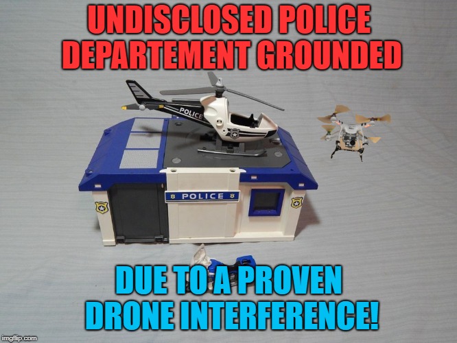 Police helicopter grounded by an alleged drone - with proof! | UNDISCLOSED POLICE DEPARTEMENT GROUNDED; DUE TO A PROVEN DRONE INTERFERENCE! | image tagged in helicopter,drone,grounded | made w/ Imgflip meme maker