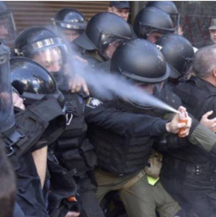 High Quality police officer pepper spraying himself Blank Meme Template