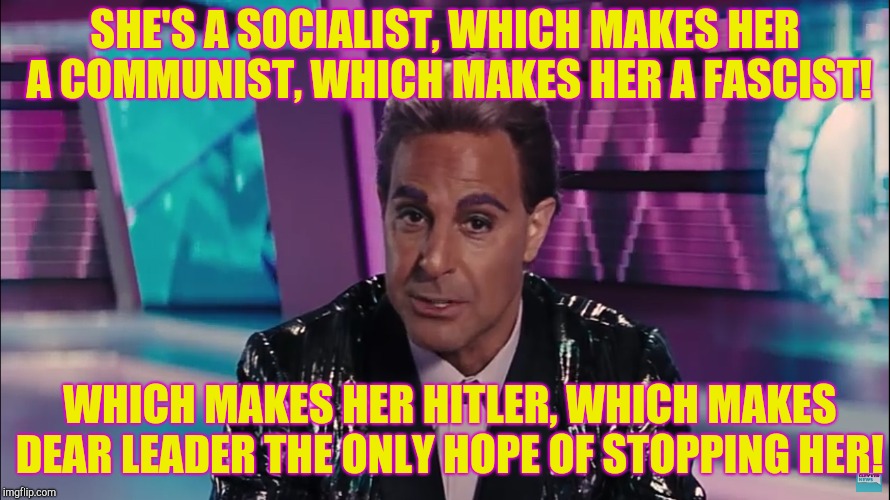 Caesar Flickerman (Stanley Tucci) | SHE'S A SOCIALIST, WHICH MAKES HER A COMMUNIST, WHICH MAKES HER A FASCIST! WHICH MAKES HER HITLER, WHICH MAKES DEAR LEADER THE ONLY HOPE OF  | image tagged in caesar flickerman stanley tucci | made w/ Imgflip meme maker