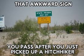 That awkward sign... | image tagged in memes,awkward,road signs,hitchhiker,driving | made w/ Imgflip meme maker