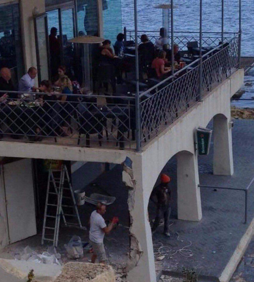 Balcony being worked on while people dine Blank Meme Template