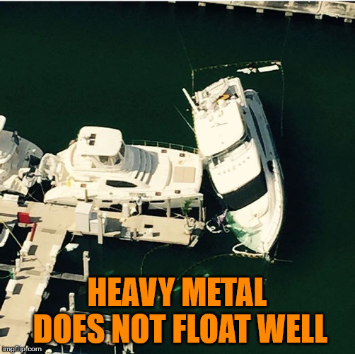 Must be a witch, metal does not float | HEAVY METAL DOES NOT FLOAT WELL | image tagged in sunken yacht,heavy metal | made w/ Imgflip meme maker