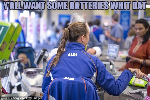 Aldi checkout girl | Y'ALL WANT SOME BATTERIES WHIT DAT | image tagged in aldi checkout girl | made w/ Imgflip meme maker