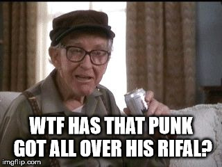 Burgess Meredith in Grumpier Old Men | WTF HAS THAT PUNK GOT ALL OVER HIS RIFAL? | image tagged in burgess meredith in grumpier old men | made w/ Imgflip meme maker