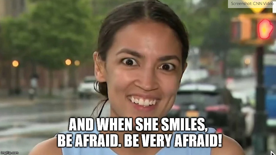 Alexandria Ocasio-Cortez | AND WHEN SHE SMILES, BE AFRAID. BE VERY AFRAID! | image tagged in alexandria ocasio-cortez | made w/ Imgflip meme maker