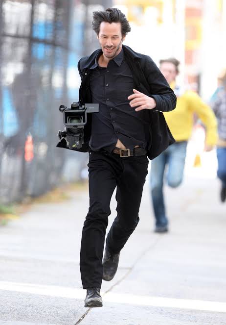 Keanu Reeves running away with camera Blank Meme Template