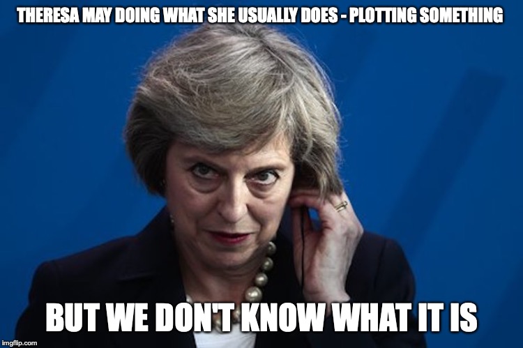 Evil Theresa May | THERESA MAY DOING WHAT SHE USUALLY DOES - PLOTTING SOMETHING; BUT WE DON'T KNOW WHAT IT IS | image tagged in theresa may,evil,memes | made w/ Imgflip meme maker