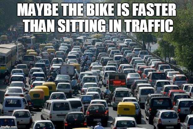 Traffic | MAYBE THE BIKE IS FASTER THAN SITTING IN TRAFFIC | image tagged in traffic | made w/ Imgflip meme maker