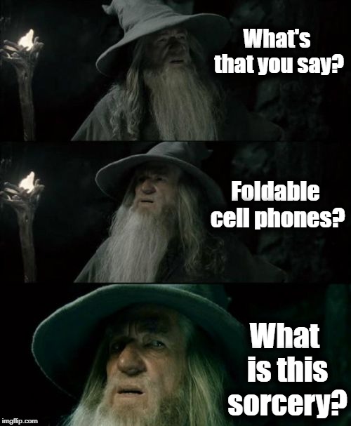 Confused Gandalf Meme | What's that you say? Foldable cell phones? What is this sorcery? | image tagged in memes,confused gandalf | made w/ Imgflip meme maker