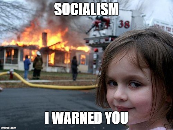 Disaster Girl | SOCIALISM; I WARNED YOU | image tagged in memes,disaster girl | made w/ Imgflip meme maker