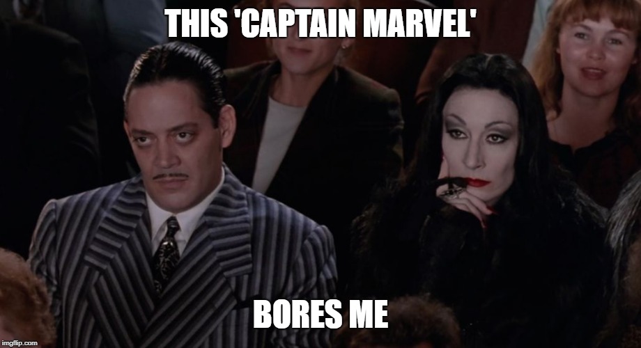 Adams Family Movie Theater | THIS 'CAPTAIN MARVEL'; BORES ME | image tagged in adams family movie theater | made w/ Imgflip meme maker