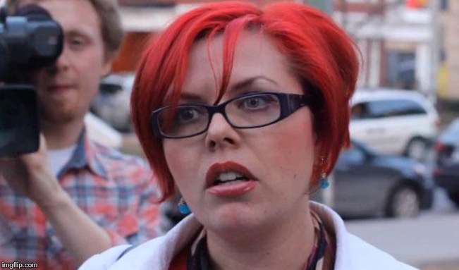 Angry Feminist | . | image tagged in angry feminist | made w/ Imgflip meme maker